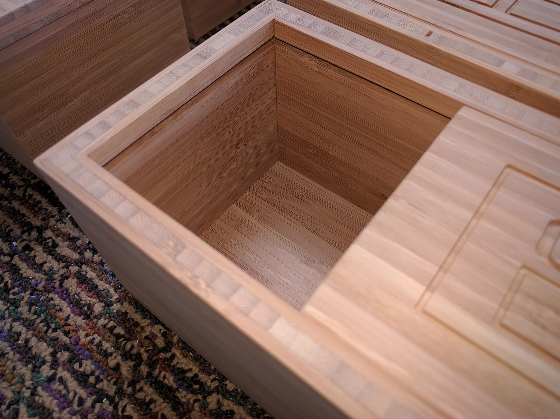 Open bamboo presentation box showing the fitted interior