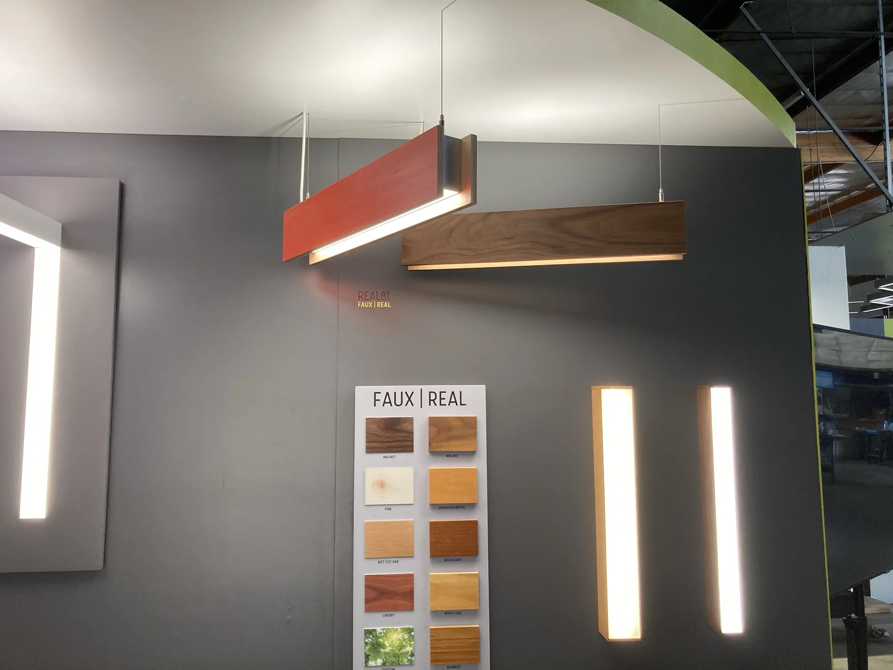 Red and walnut pendant lights displayed together